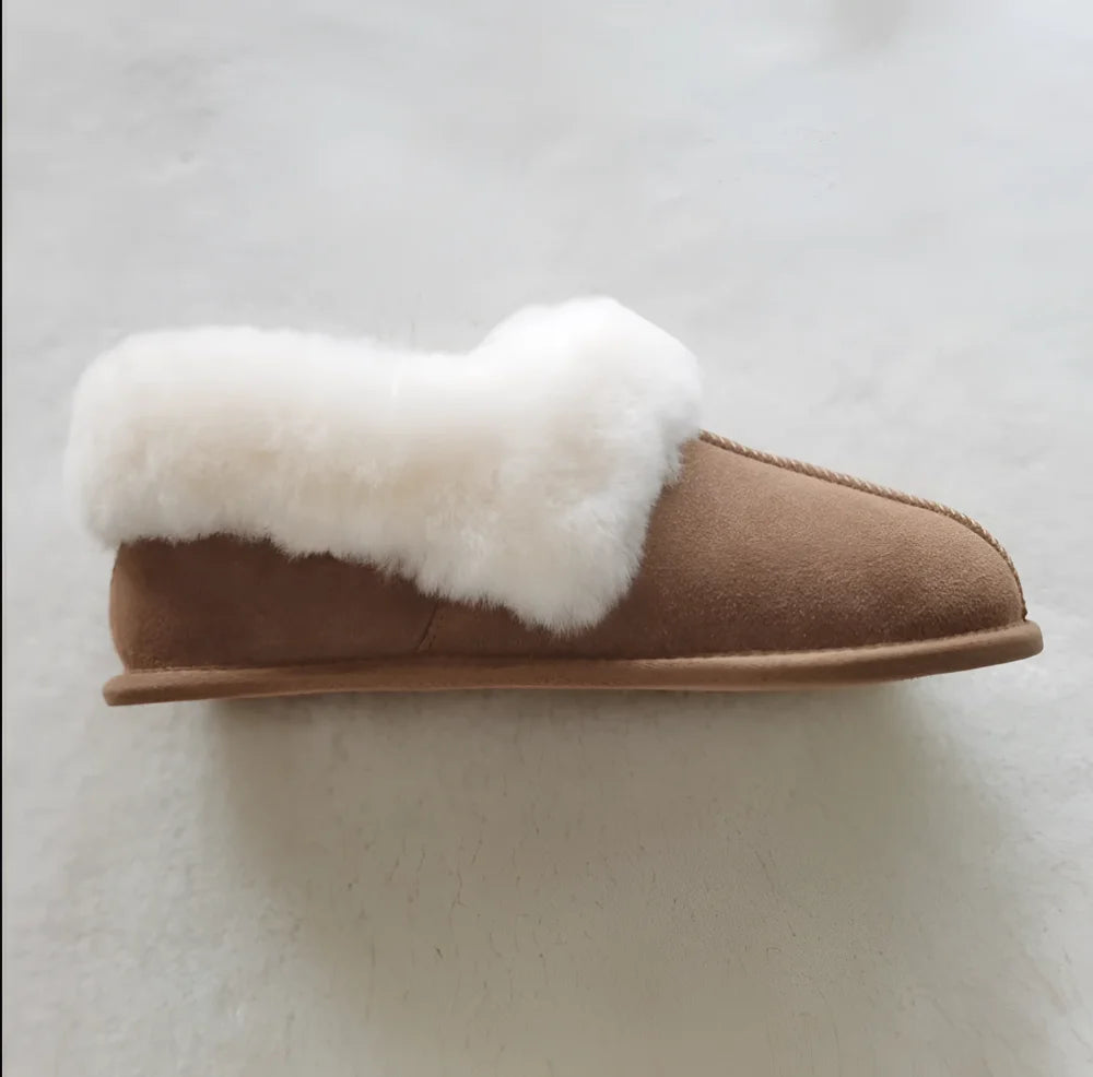 Brown suede sheepskin slippers with plush white shearling lining perfect for cozy fall wear
