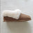 Brown suede sheepskin slippers with plush white shearling lining perfect for cozy fall wear