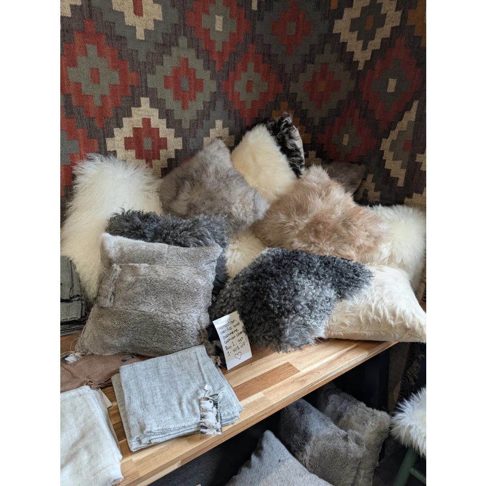 Plush faux fur pillows in neutral tones for cozy decor and sheepskin cushion covers