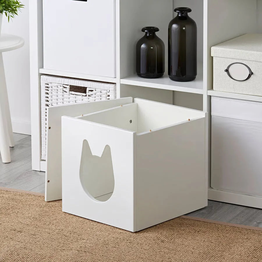 White cat-shaped litter box with smooth painted surfaces designed to fit ikea kallax boxes using merino sheepskins
