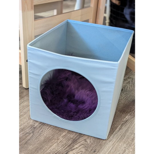 Light blue fabric storage box with plush purple merino sheepskins interior fits ikea kallax cat boxes meeting strict european standards