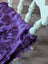 Grape purple sheepskin chair pad with faux fur, mint legs, white pom-poms