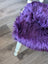 Grape purple merino sheepskin chair pad on faux fur stool with white legs
