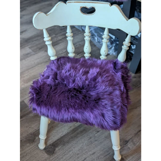 Grape purple merino sheepskin chair pad with lavender faux fur and heart cutouts
