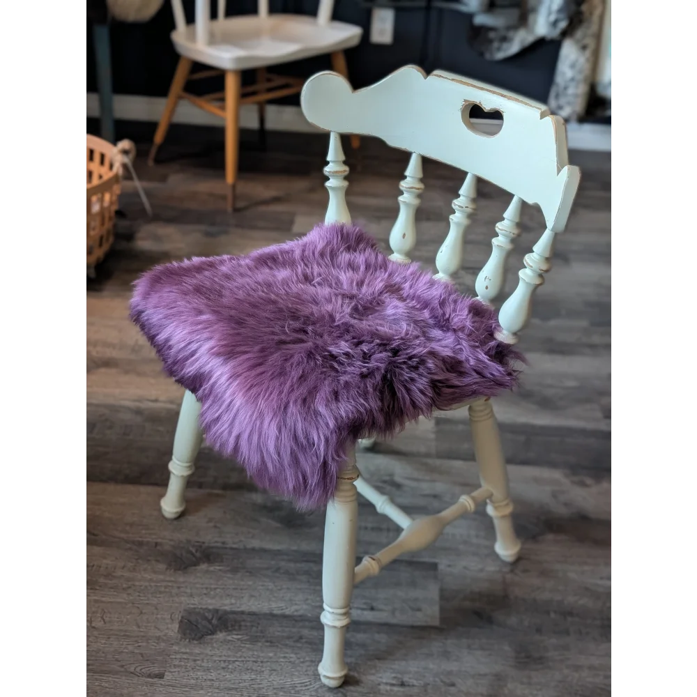Plum purple merino sheepskin chair pad with heart cutout, eco friendly