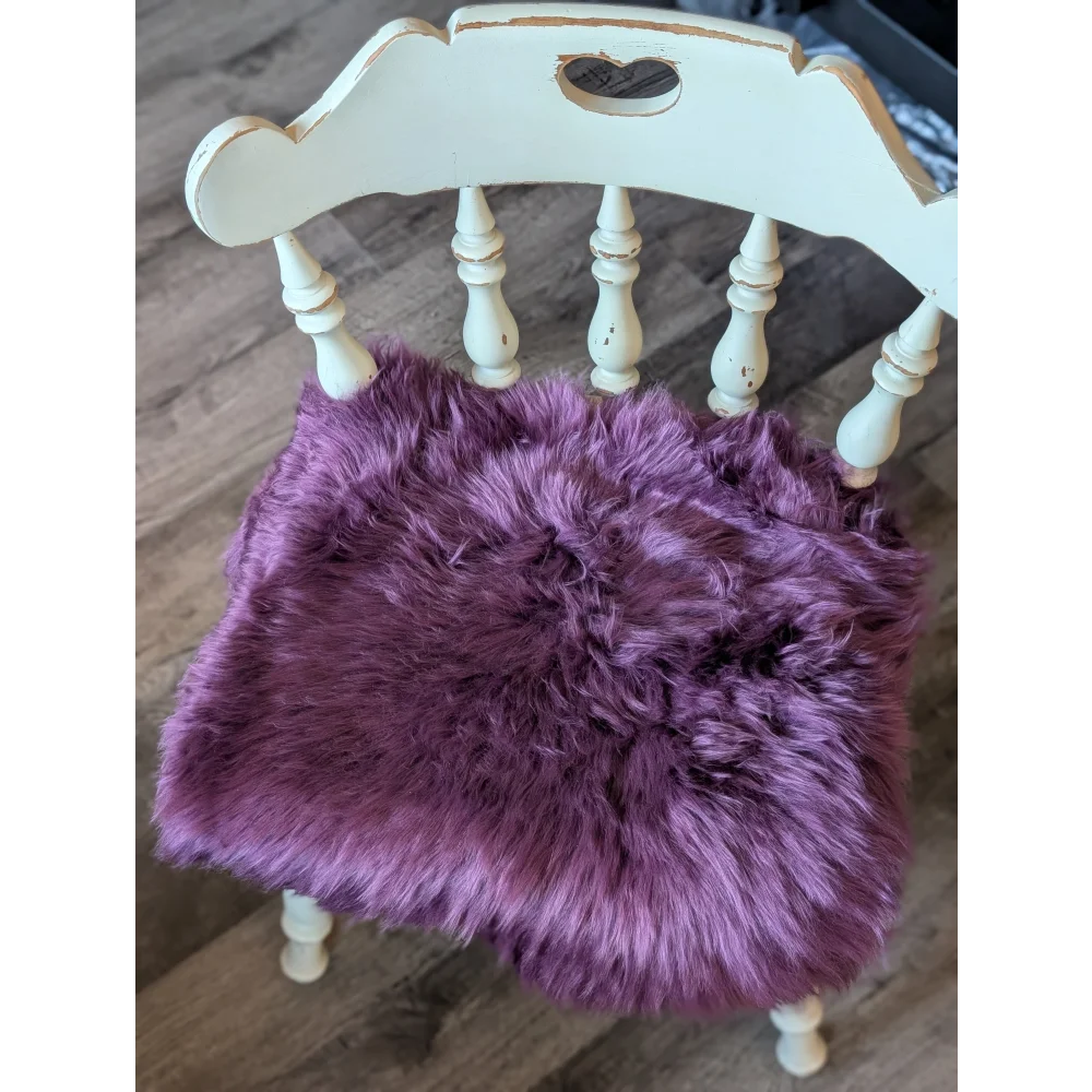 Plum purple lavender faux fur chair pad with heart cutout on white frame