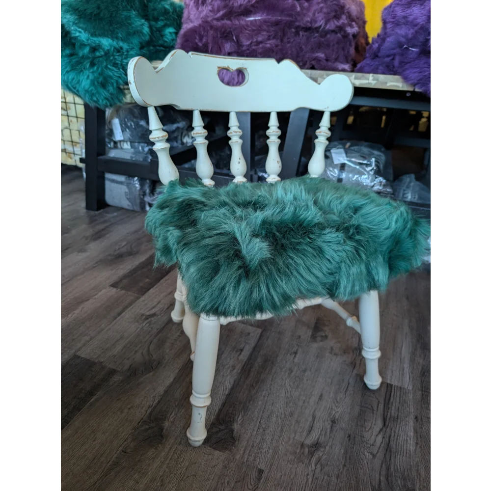 Gorgeous green merino sheepskin chair pad with faux fur comfort