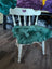 Gorgeous green merino sheepskin chair pad with faux fur comfort