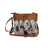 Ornate brown leather hairon bag with cowhide, studs and buckle