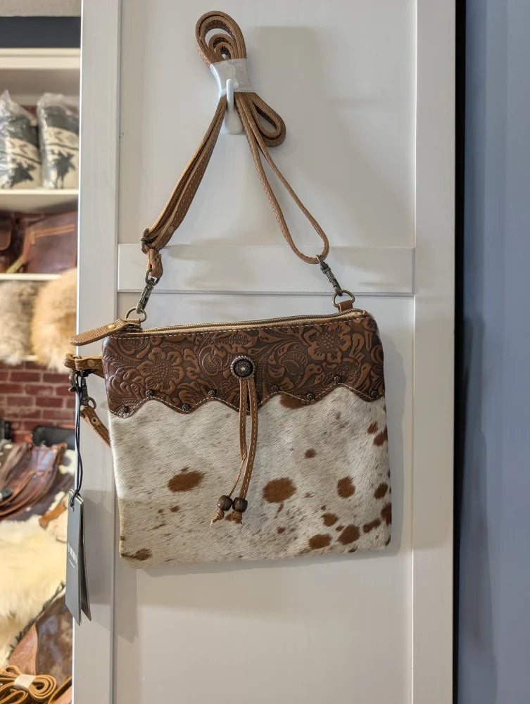 Ornate brown leather hairon bag with cowhide crossbody