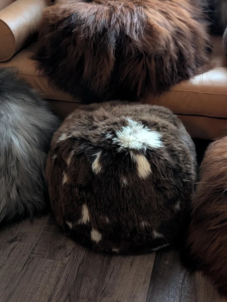Natural British Angus Oliver floor pouf in brown white sheepskin