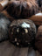 Natural British Angus Oliver floor pouf in brown white sheepskin