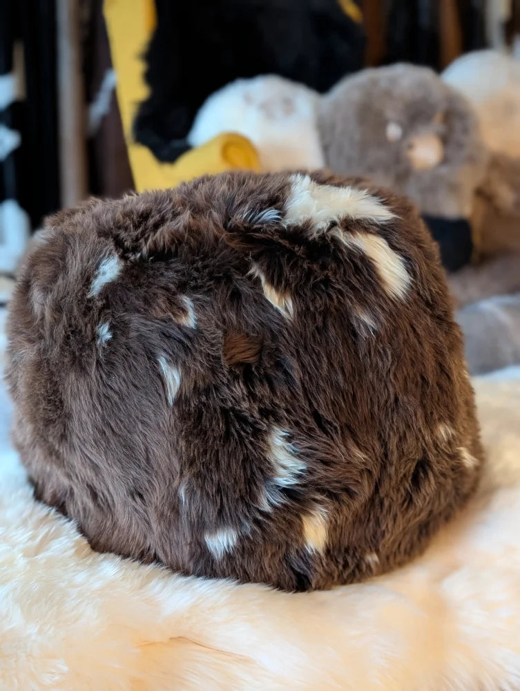 Plush natural British sheepskin floor pouf by Angus Oliver