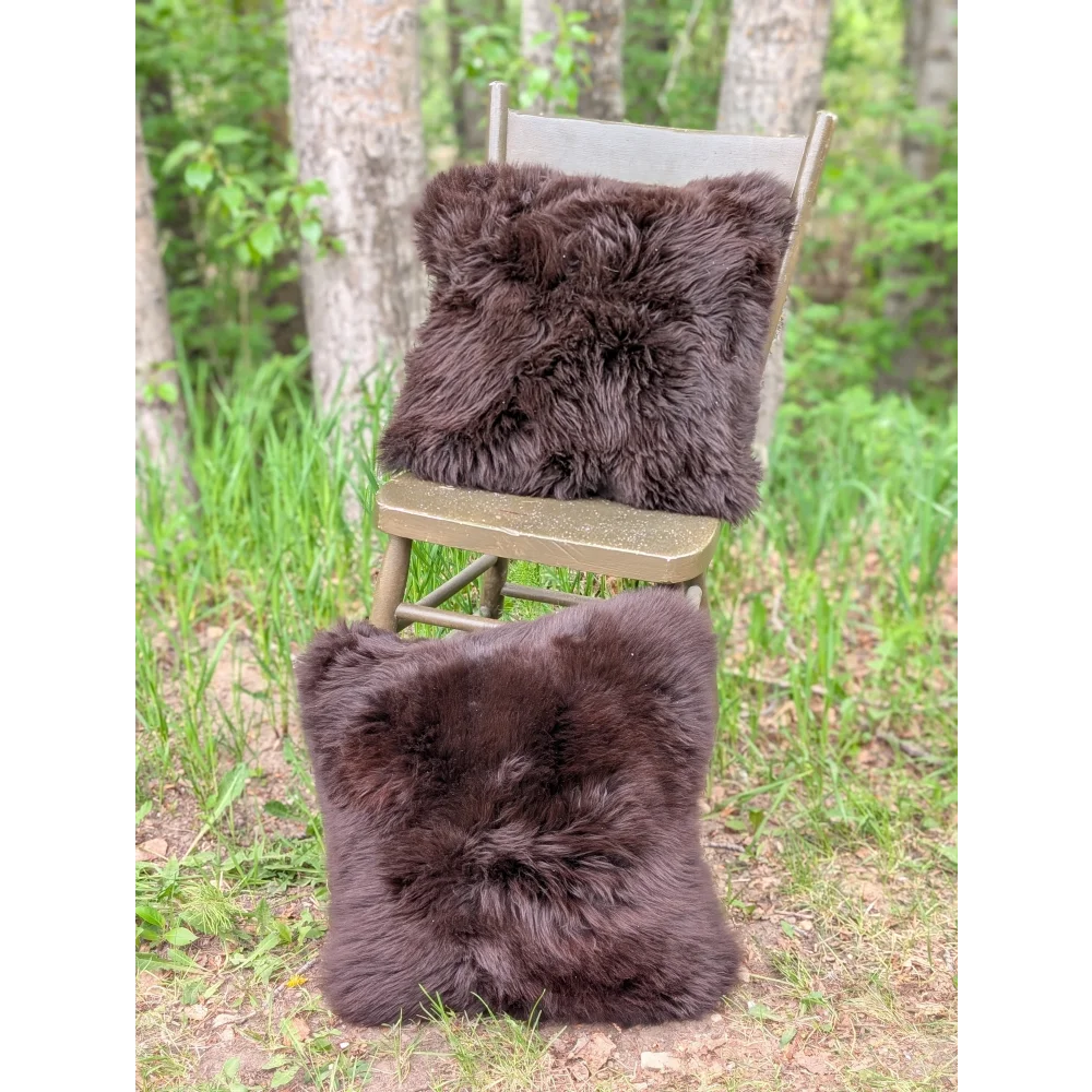 Pair of handmade dark brown plush brazilian cowhide cushions perfect as cozy british sheepskin throw pillows