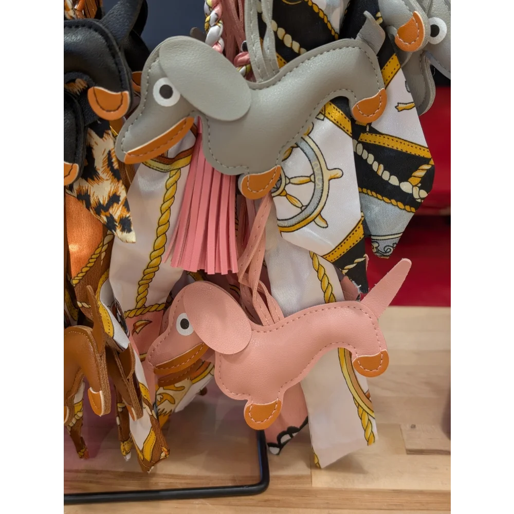 Pink dachshund bag charm in gray pink real leather with orange accents