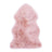 Soft pink dyed merino sheepskins with natural fluffy texture and irregular edges for cozy home decor