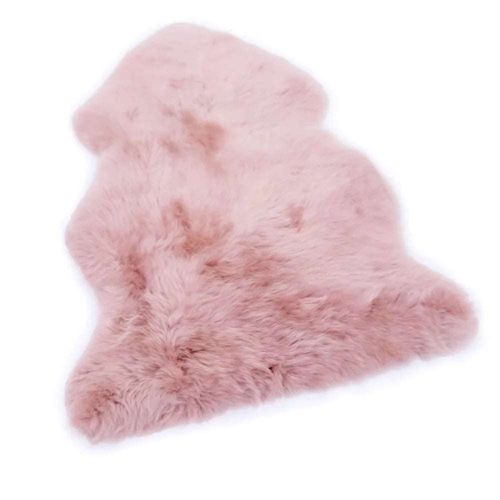 Pink merino sheepskin dyed merino sheepskins with fluffy texture and natural edges meeting strict european standards
