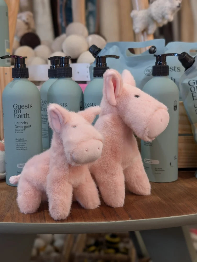 Soft pink plush large size donkey toys with embroidered eyes and stitched details from pink piggies collection