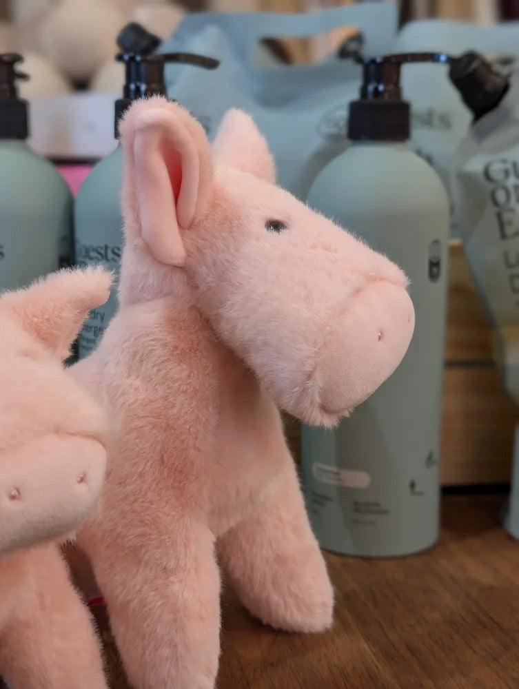 A large size pink piggies soft plush toy with fluffy texture and embroidered facial features