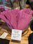 Two pairs of pink sheepskin gloves in brilliant shade, size 10-12