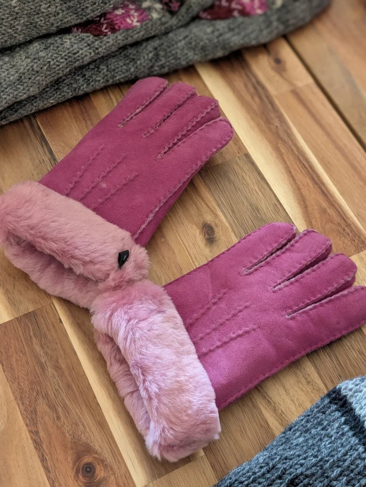 Ten pairs of brilliant shade pink sheepskin gloves with fur lining