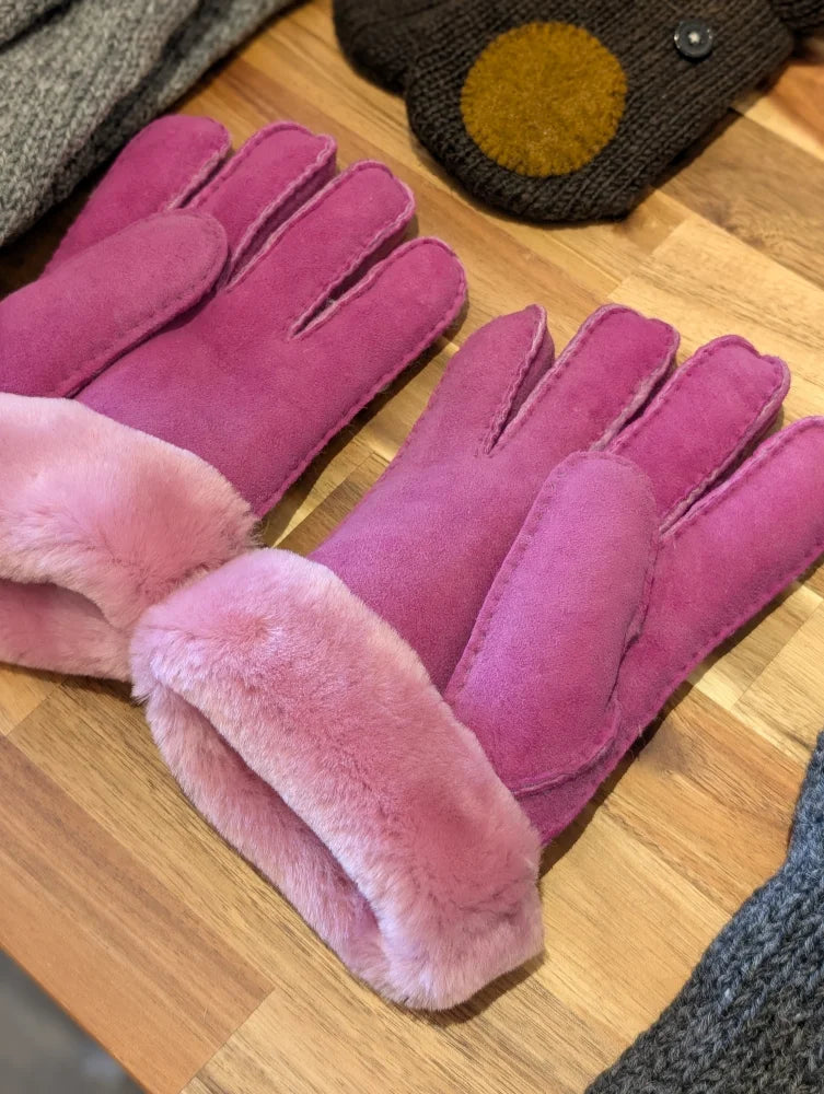 Two pairs of pink sheepskin gloves in brilliant shade with fur lining and touchscreen capability