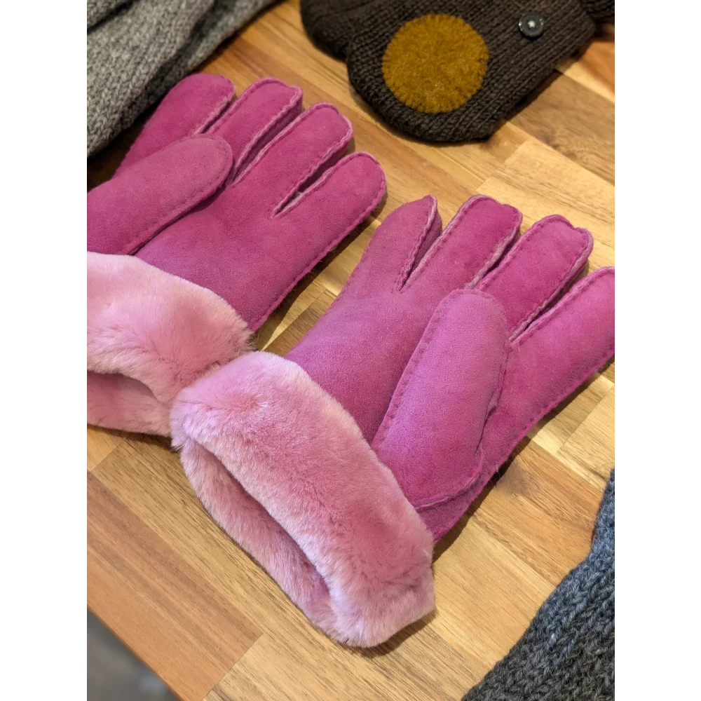 Two pairs of pink sheepskin gloves in brilliant shade with fur lining and touchscreen capability