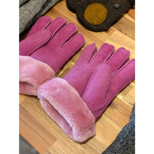 Two pairs of pink sheepskin gloves in brilliant shade with fur lining and touchscreen capability