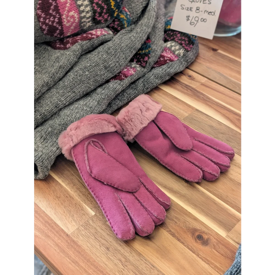 Two pairs of brilliant shade pink sheepskin gloves with fur trim
