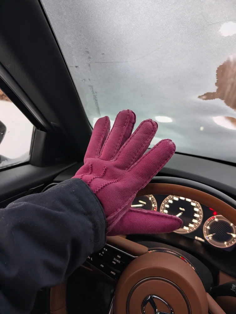 Plush pink sheepskin gloves in magenta suede with stitched back detailing