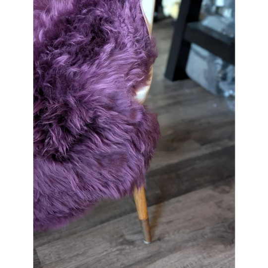 Gorgeous plum purple merino sheepskin chair with lavender fur, wooden legs, brass accents
