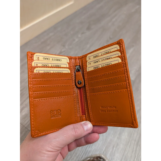 Orange leather pocket card holder with card slots and red zipper