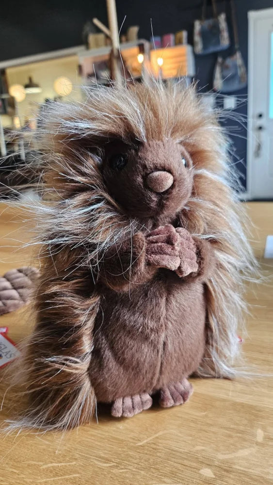 Prickle porcupine plush toy with soft brown and cream fur and tiny feet perfect for cuddling and play