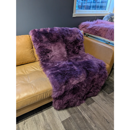 Vibrant purple sheepskin area rug 68x35 inches, plush and fluffy