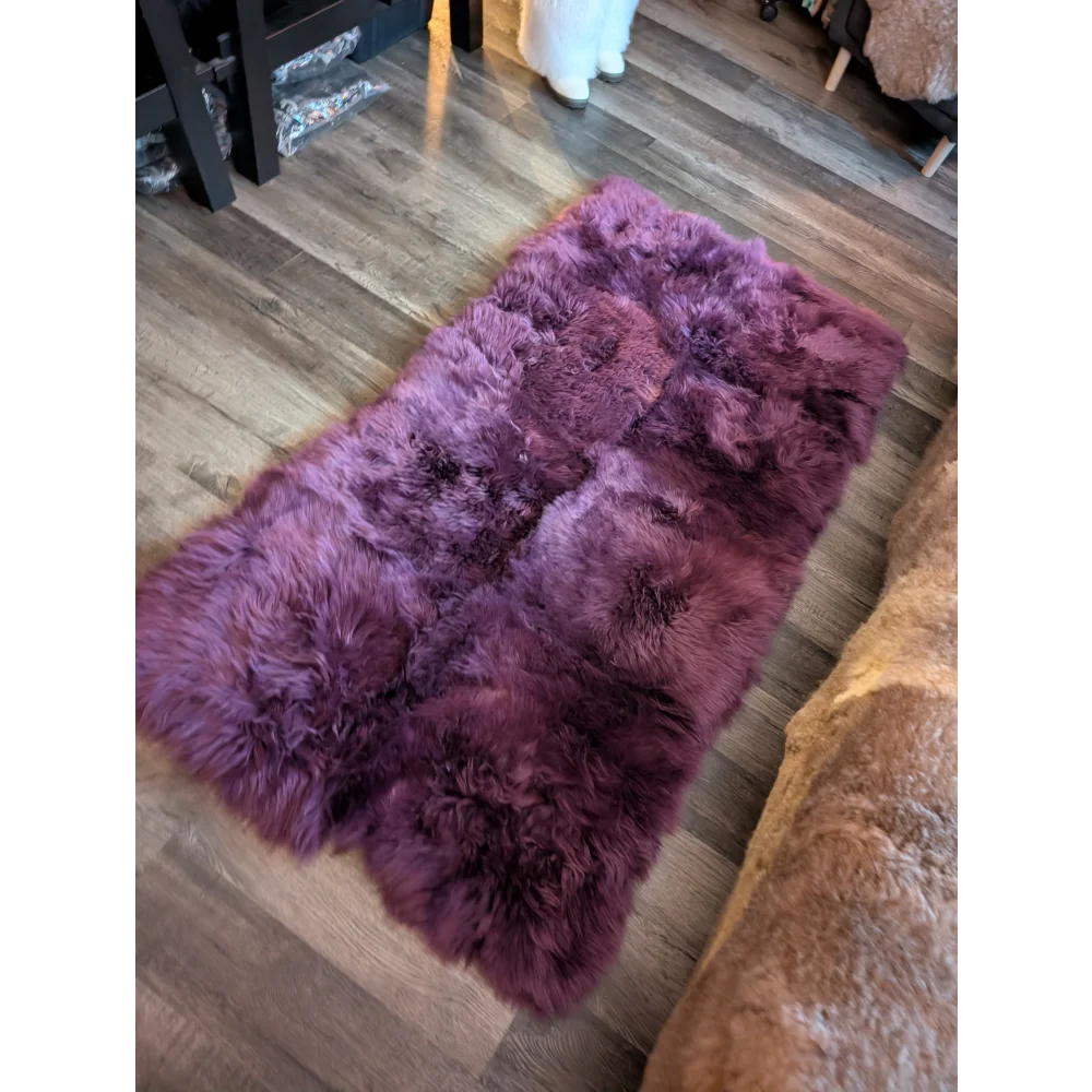 Purple sheepskin area rug 68x35 inches with soft fur texture