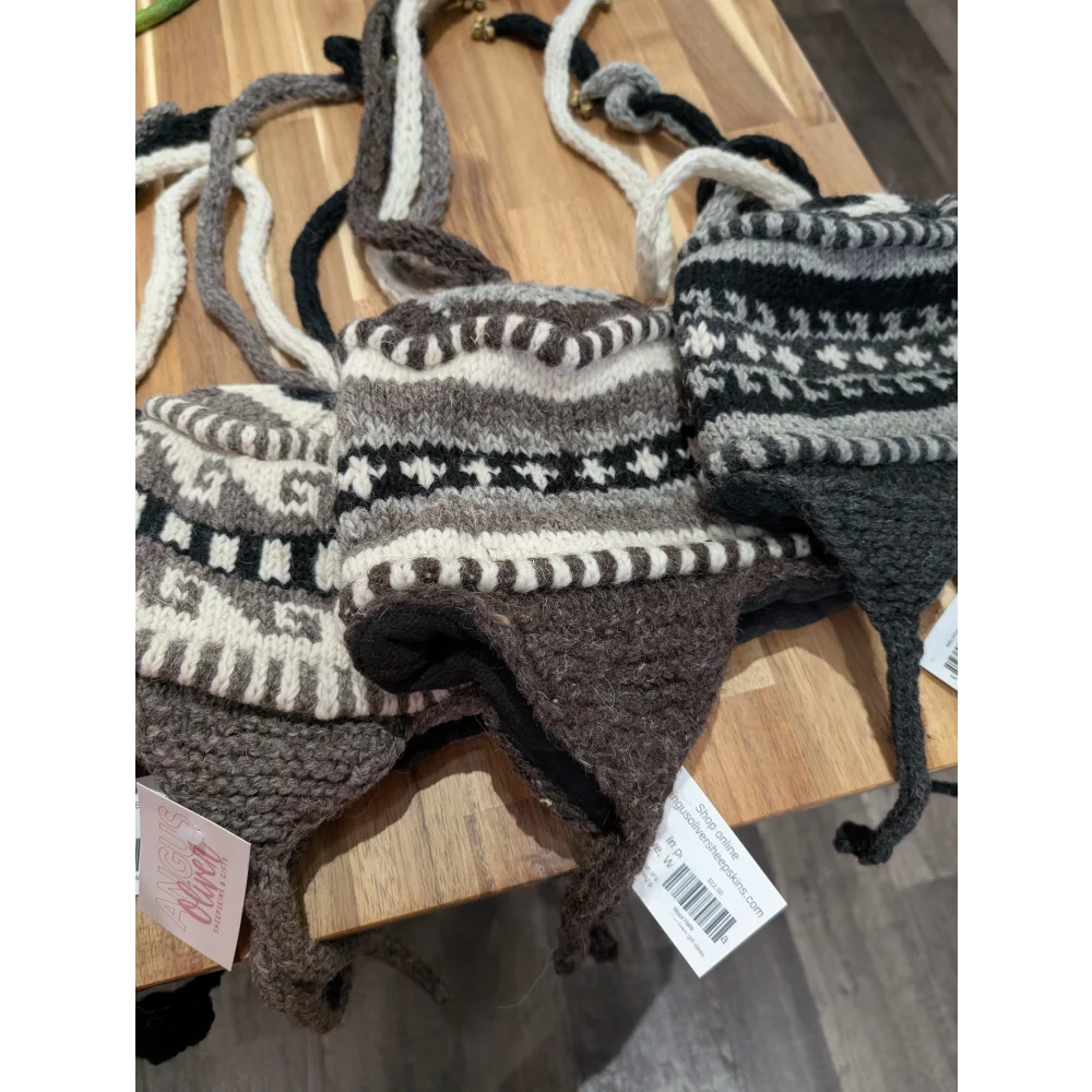 Cozy winter wool hat with black white knit earflaps