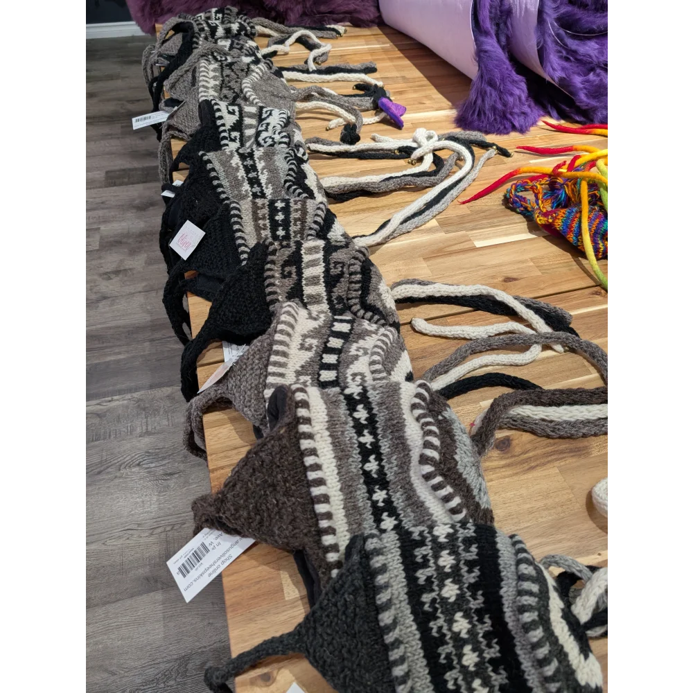 Black and white wool knitted scarf with intricate patterns for wool hats