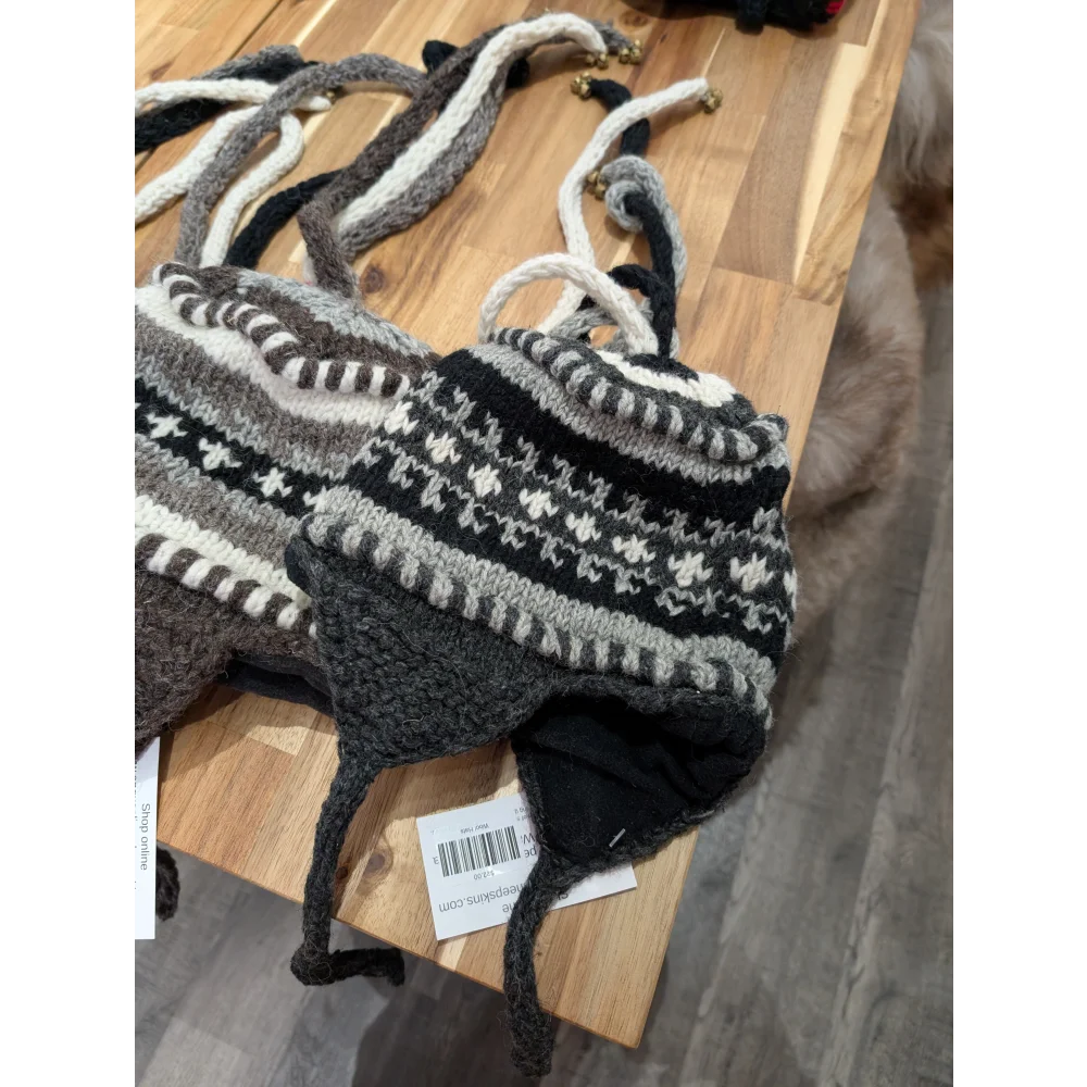 Black and white fair isle wool hat with tassels