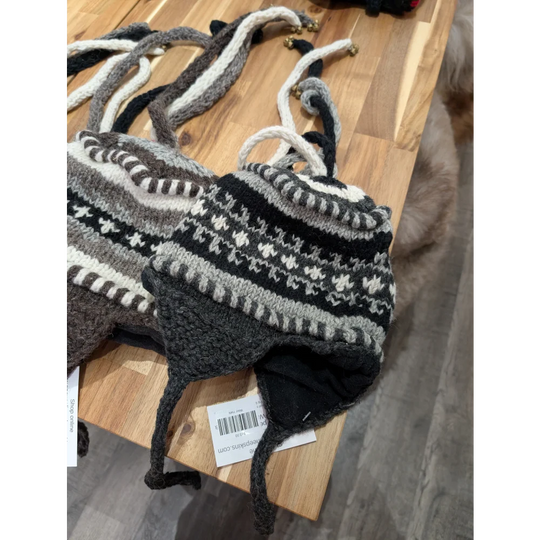 Black and white fair isle wool hat with tassels