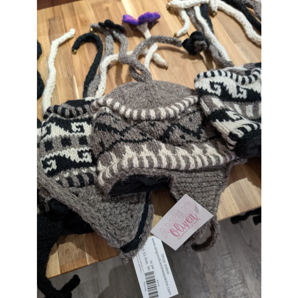 Cozy gray and white fair isle wool hat with ear flaps