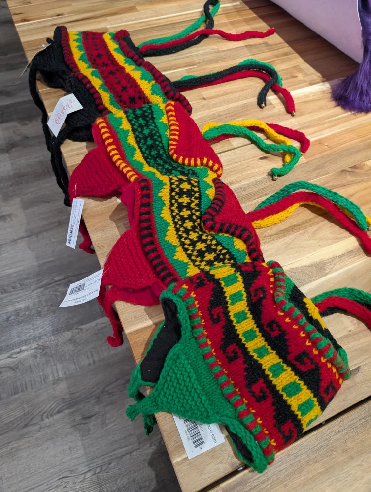 Colorful rasta crochet wool hat with black trim stripes