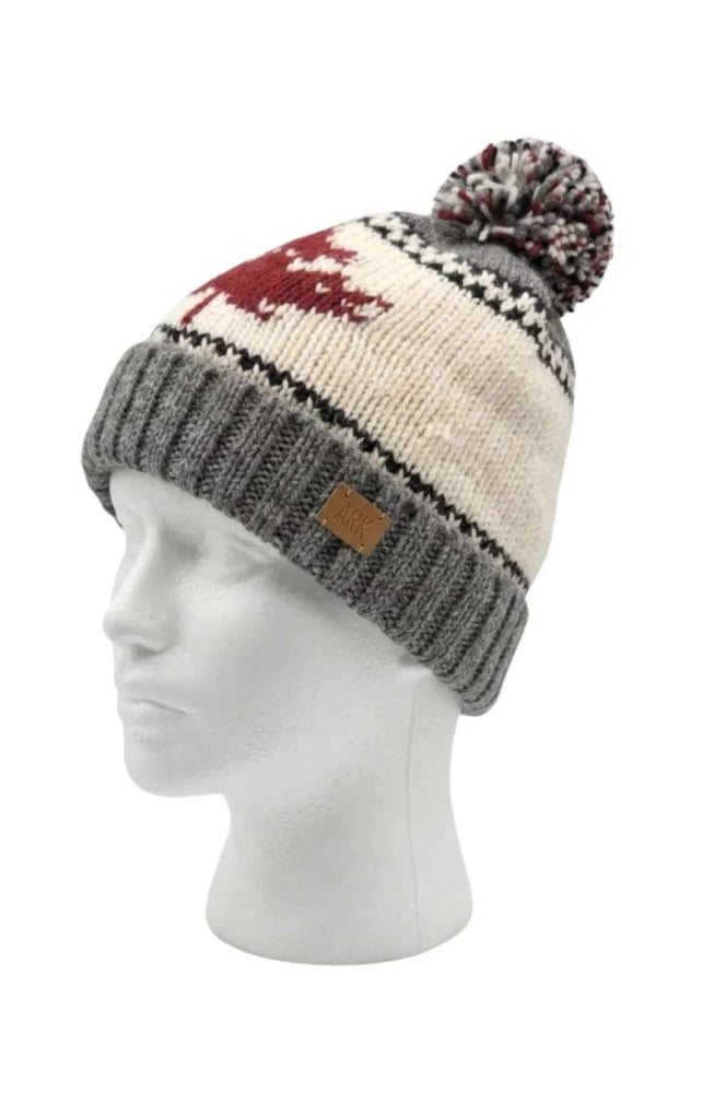 Cream-colored real wool canadian pom pom hat with red reindeer pattern gray brim made from soft fleece fair trade zealand wool