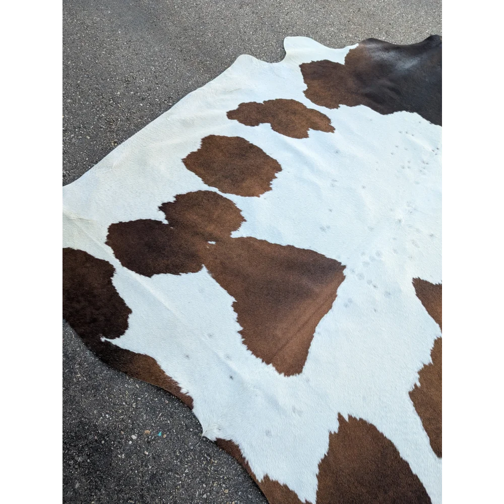 Extra large 96x84.5 cowhide rug with brown white patches and leather texture