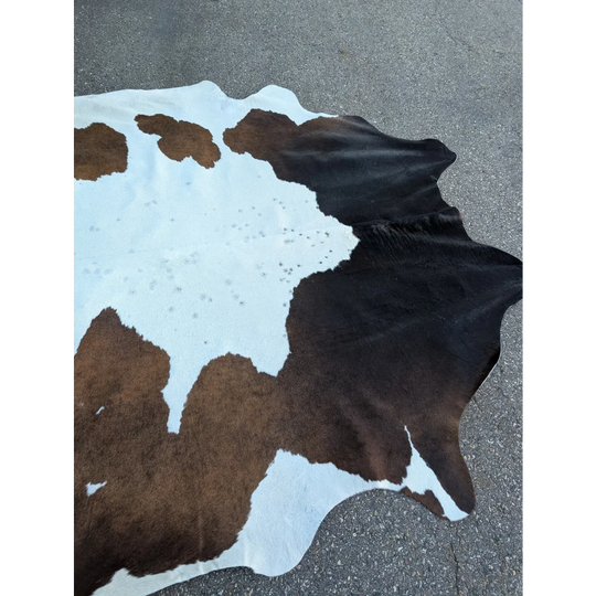 Extra large cowhide rug with brown and white patches, 96’’ x 84.5