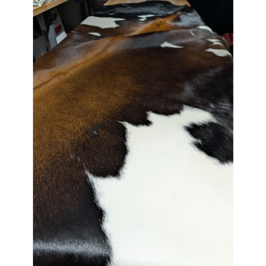 Extra large cowhide rug with brown white patches leather texture