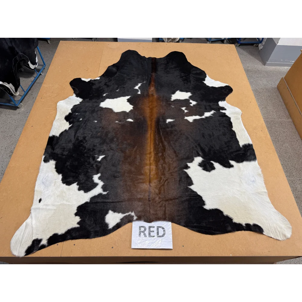 Extra large cowhide rug with black white patches brown center leather texture