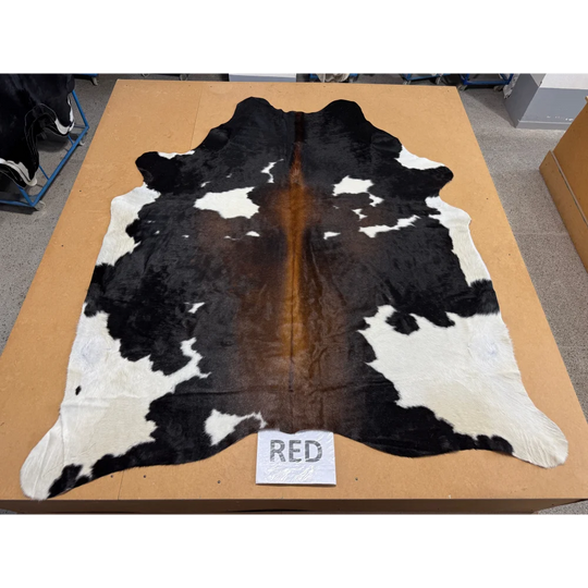 Extra large cowhide rug with black white patches brown center leather texture