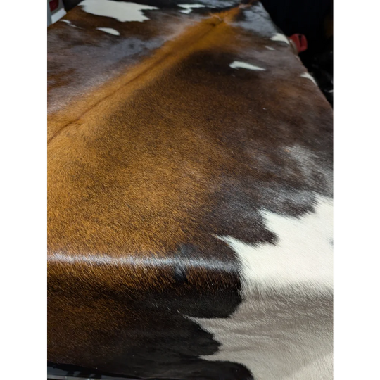 Extra large cowhide rug with brown white patches and leather texture