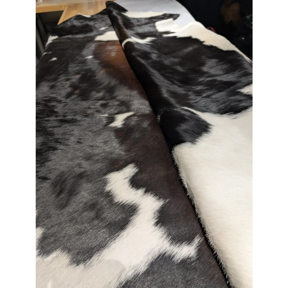 Extra large cowhide rug with black and white patches, soft texture