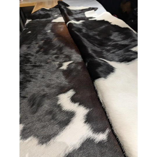 Extra large cowhide rug with black and white patches, soft texture